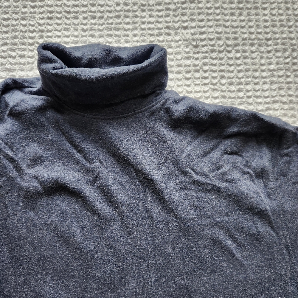 blue turtle neck